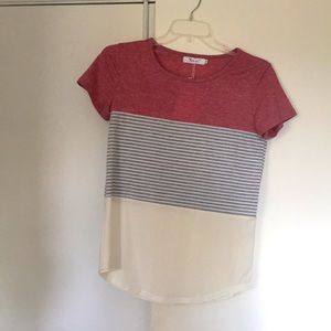 Size small pink, white and grey tee shirt.